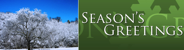 Season's Greetings banner with snow covered tree