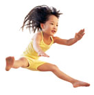 girl in yellow jumping