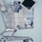 Shopping cart with computer parts for recycling