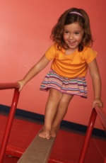 Girl on balance beam
