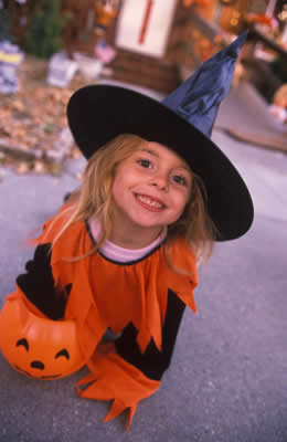Girl in Halloween clothing