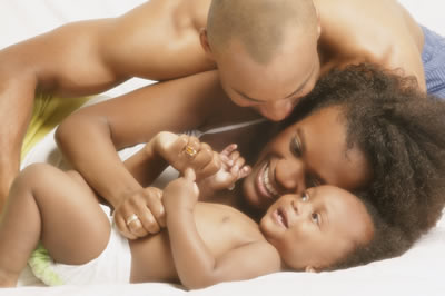 African American couple with baby