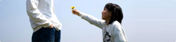 Girl Giving Flower